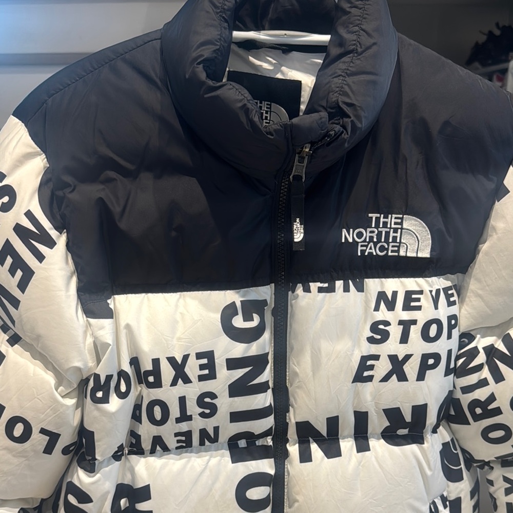 The North Face Black and White Text Puffer Jacket